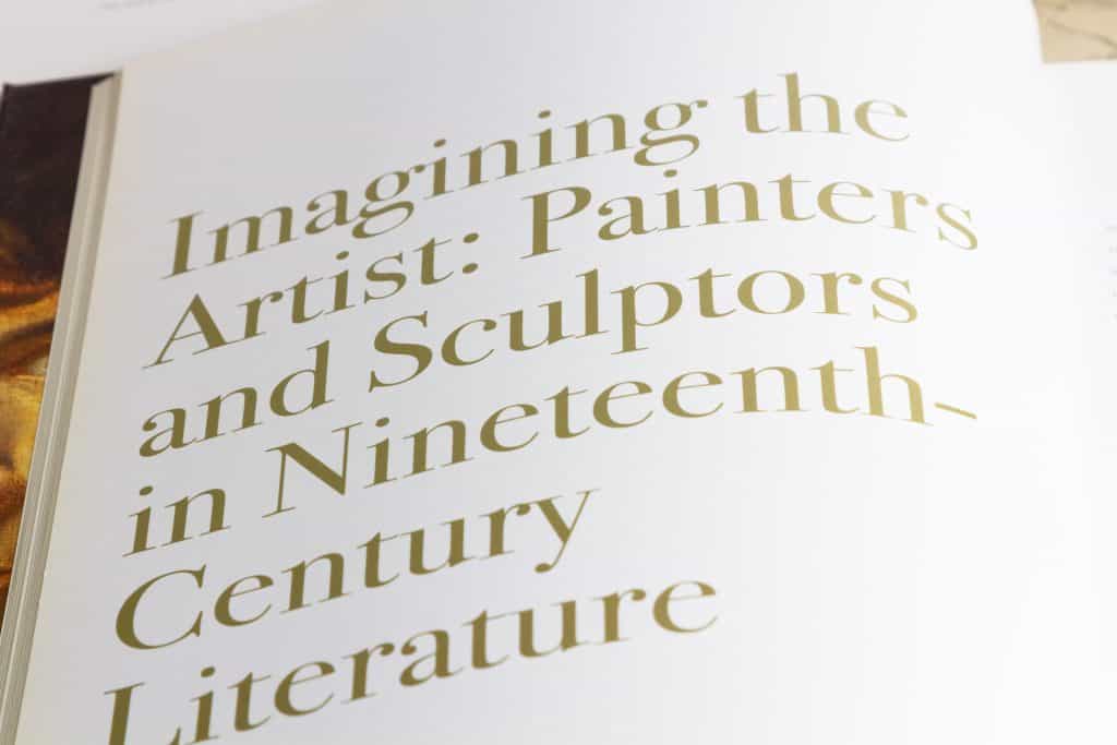 Detail of the title spread of the essay Imagining the Artist: Painters and Sculptors in Nineteenth Century Literature in the National Gallery exhibition catalogue Rebels and Martyrs. The title is in very big, bold brown Didot typeface.